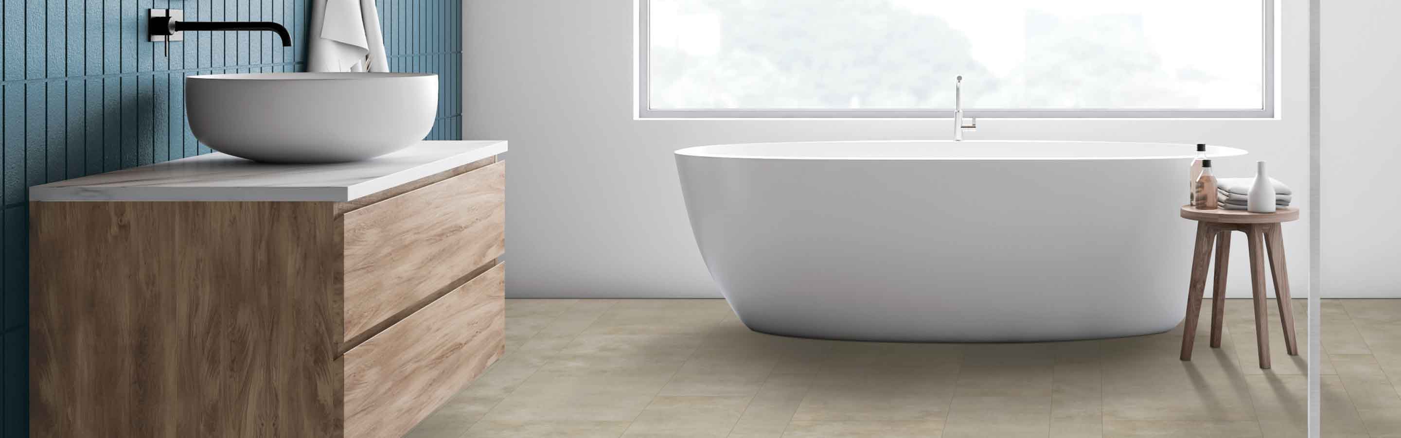 bathroom with freestanding tub and vinyl flooring