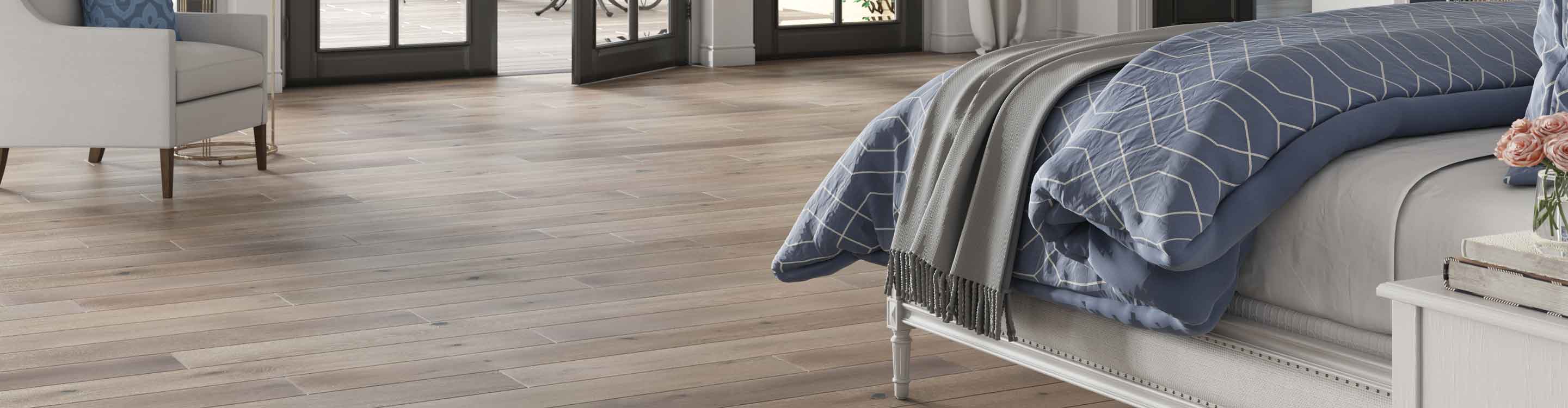 Ash brown hardwood flooring in a bedroom with fireplace